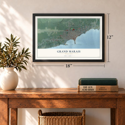 Grand Marais, Minnesota map, 12 x 18 inch print in a black frame in an entryway
