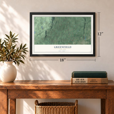 Greenfield, New York map, 12 x 18 inch print in a black frame in an entryway
