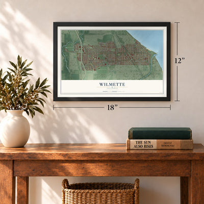 Wilmette, Illinois map, 12 x 18 inch print in a black frame in an entryway