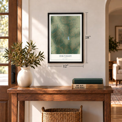 Oak Valley, Texas map, 12 x 18 inch print in a black frame in an entryway