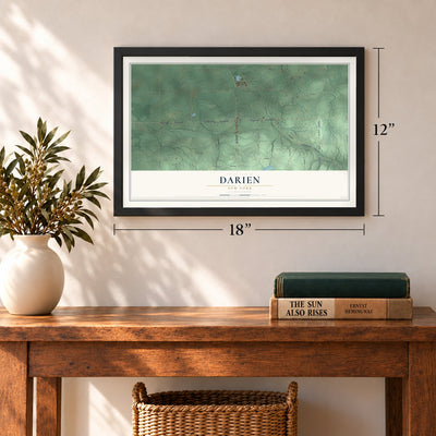 Darien, New York map, 12 x 18 inch print in a black frame in an entryway