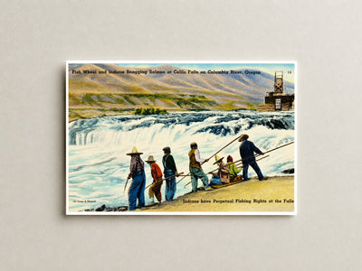 Columbia River, OR: Fish Wheel and Indian Snagging Salmon at Celilo Falls on Columbia River, Oregon. Indians have perpetual fishing rights at the falls.