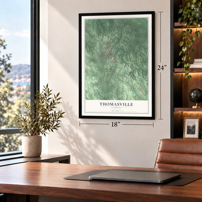 Thomasville, Alabama map, 18 x 24 inch print in a black frame in a home office
