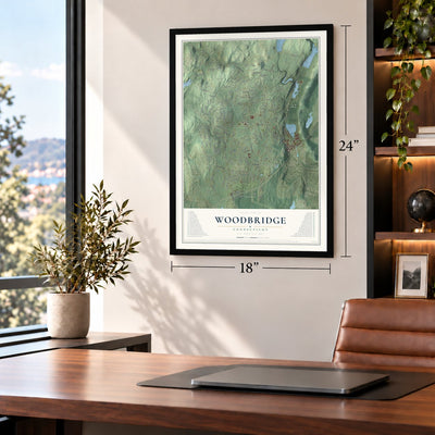 Woodbridge, Connecticut map, 18 x 24 inch print in a black frame in a home office