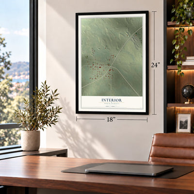 Interior, South Dakota map, 18 x 24 inch print in a black frame in a home office