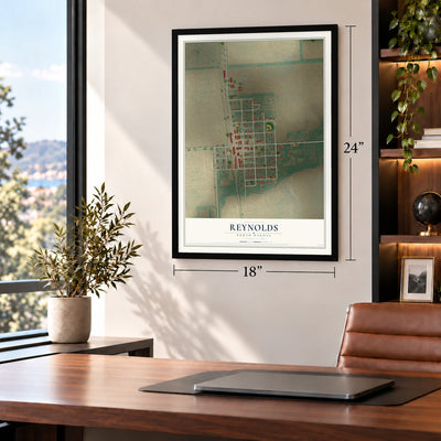 Reynolds, North Dakota map, 18 x 24 inch print in a black frame in a home office