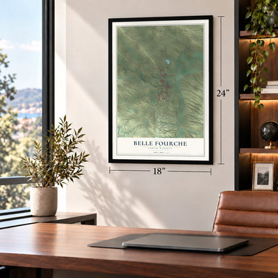 Belle Fourche, South Dakota map, 18 x 24 inch print in a black frame in a home office