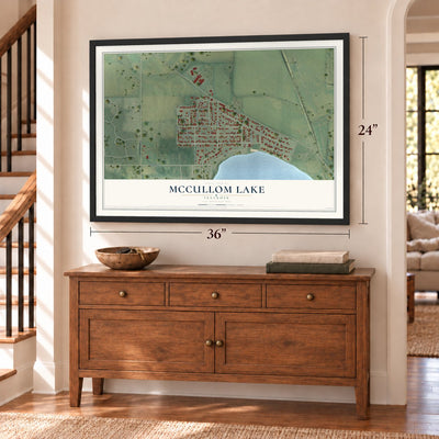 McCullom Lake, Illinois map, 24 x 36 inch print in a black frame above a dresser by a staircase