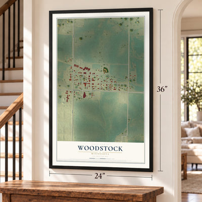 Woodstock, Minnesota map, 24 x 36 inch print in a black frame by a staircase