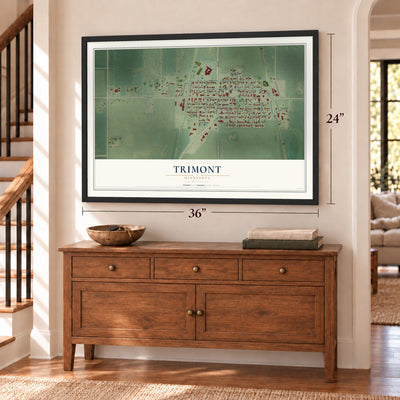 Trimont, Minnesota map, 24 x 36 inch print in a black frame above a dresser by a staircase