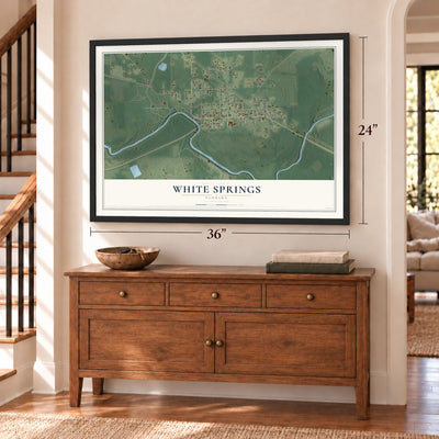 White Springs, Florida map, 24 x 36 inch print in a black frame above a dresser by a staircase