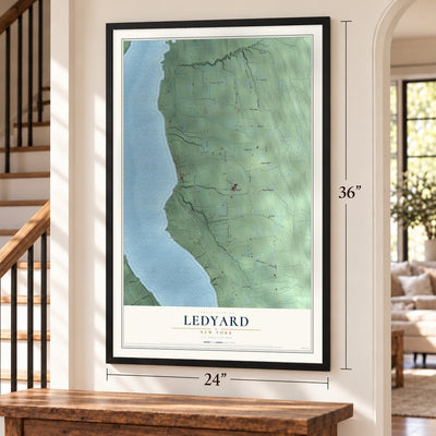 Ledyard, New York map, 24 x 36 inch print in a black frame by a staircase