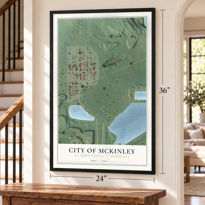 McKinley, Minnesota map, 24 x 36 inch print in a black frame by a staircase