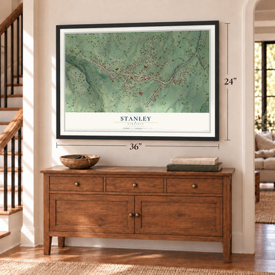 Stanley, Virginia map, 24 x 36 inch print in a black frame above a dresser by a staircase