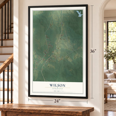 Wilson, Louisiana map, 24 x 36 inch print in a black frame by a staircase
