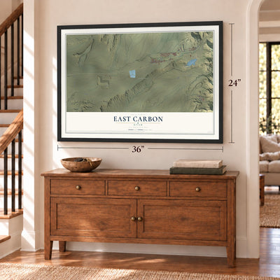 East Carbon, Utah map, 24 x 36 inch print in a black frame above a dresser by a staircase