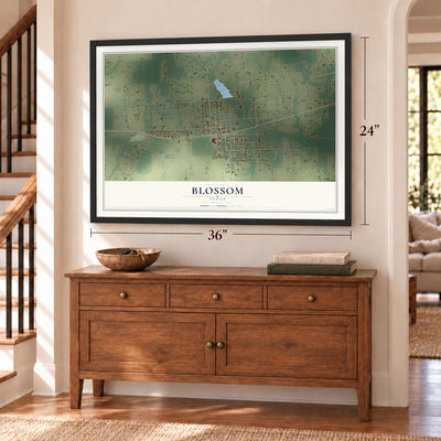 Blossom, Texas map, 24 x 36 inch print in a black frame above a dresser by a staircase