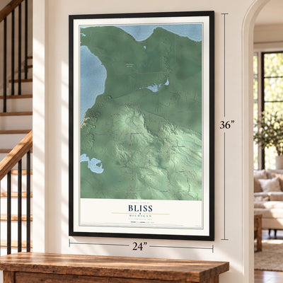 Bliss, Michigan map, 24 x 36 inch print in a black frame by a staircase