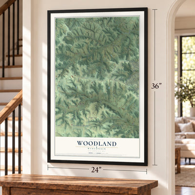 Woodland, Wisconsin map, 24 x 36 inch print in a black frame by a staircase