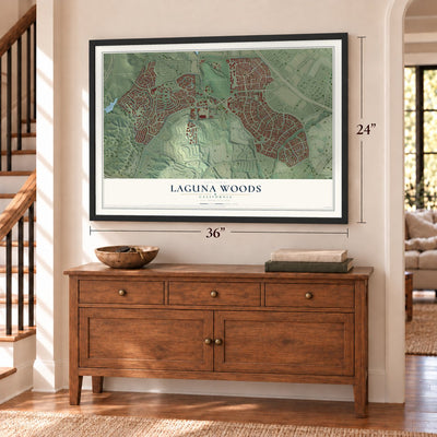 Laguna Woods, California map, 24 x 36 inch print in a black frame above a dresser by a staircase
