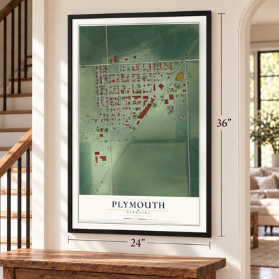 Plymouth, Nebraska map, 24 x 36 inch print in a black frame by a staircase