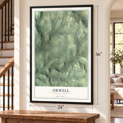 Orwell, Pennsylvania map, 24 x 36 inch print in a black frame by a staircase