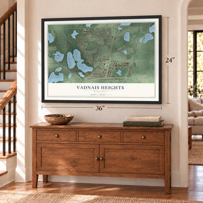 Vadnais Heights, Minnesota map, 24 x 36 inch print in a black frame above a dresser by a staircase