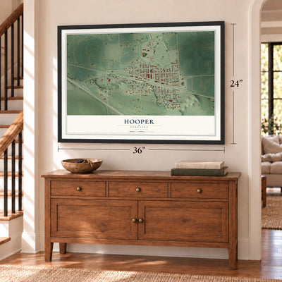 Hooper, Nebraska map, 24 x 36 inch print in a black frame above a dresser by a staircase