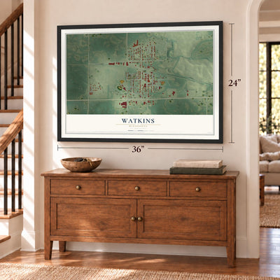 Watkins, Minnesota map, 24 x 36 inch print in a black frame above a dresser by a staircase
