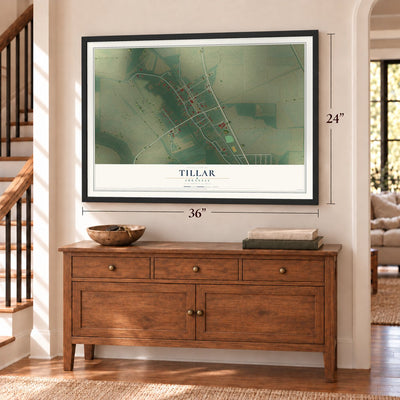Tillar, Arkansas map, 24 x 36 inch print in a black frame above a dresser by a staircase