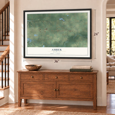 Amber, Michigan map, 24 x 36 inch print in a black frame above a dresser by a staircase
