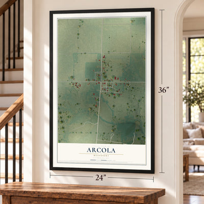 Arcola, Missouri map, 24 x 36 inch print in a black frame by a staircase