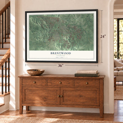 Brentwood, Tennessee map, 24 x 36 inch print in a black frame above a dresser by a staircase