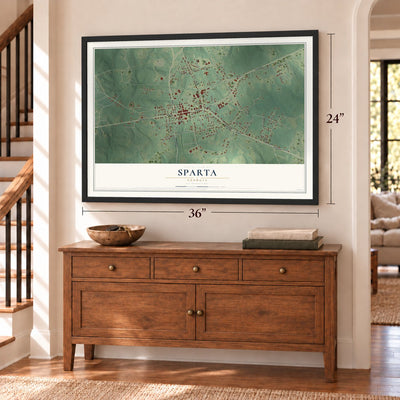 Sparta, Georgia map, 24 x 36 inch print in a black frame above a dresser by a staircase