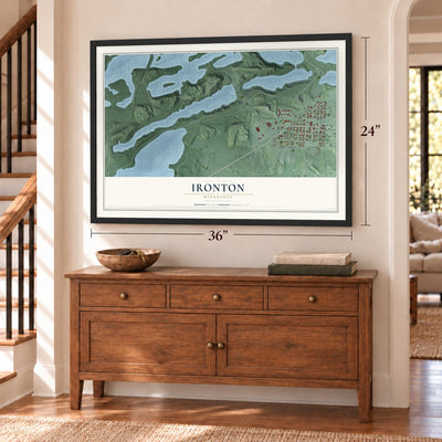 Ironton, Minnesota map, 24 x 36 inch print in a black frame above a dresser by a staircase