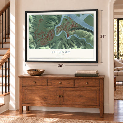 Reedsport, Oregon map, 24 x 36 inch print in a black frame above a dresser by a staircase