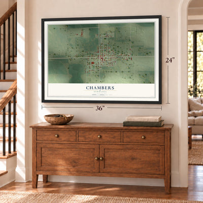 Chambers, Nebraska map, 24 x 36 inch print in a black frame above a dresser by a staircase