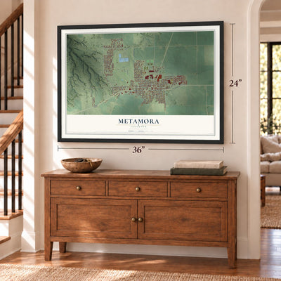 Metamora, Illinois map, 24 x 36 inch print in a black frame above a dresser by a staircase