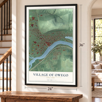 Village of Owego, New York map, 24 x 36 inch print in a black frame by a staircase