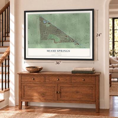 Miami Springs, Florida map, 24 x 36 inch print in a black frame above a dresser by a staircase