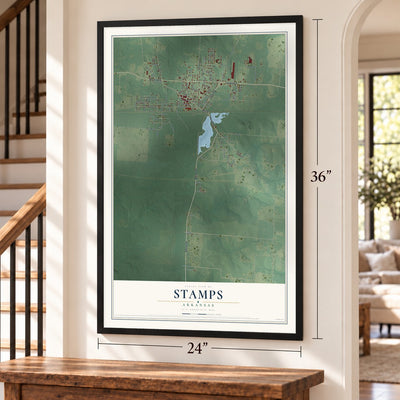 Stamps, Arkansas map, 24 x 36 inch print in a black frame by a staircase