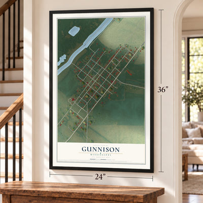 Gunnison, Mississippi map, 24 x 36 inch print in a black frame by a staircase