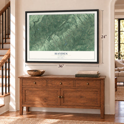 Hayden, Alabama map, 24 x 36 inch print in a black frame above a dresser by a staircase