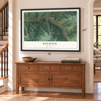 Red River, New Mexico map, 24 x 36 inch print in a black frame above a dresser by a staircase