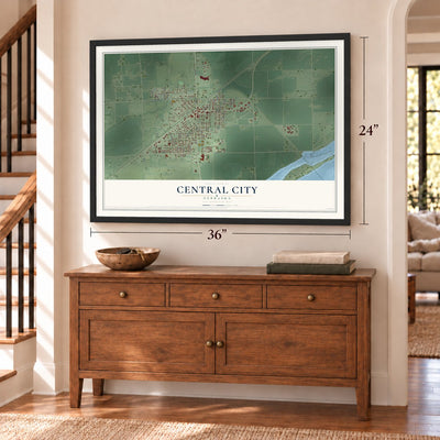 Central City, Nebraska map, 24 x 36 inch print in a black frame above a dresser by a staircase