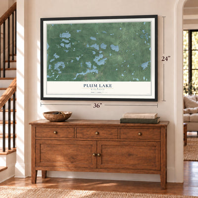 Plum Lake, Wisconsin map, 24 x 36 inch print in a black frame above a dresser by a staircase