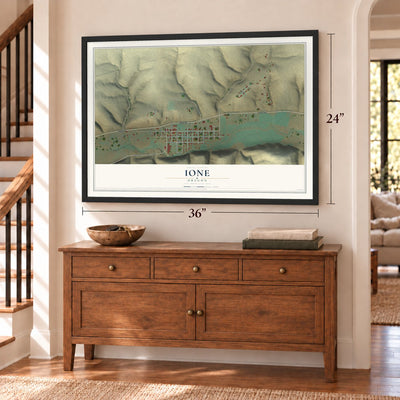 Ione, Oregon map, 24 x 36 inch print in a black frame above a dresser by a staircase