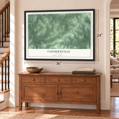 Farmersville, New York map, 24 x 36 inch print in a black frame above a dresser by a staircase