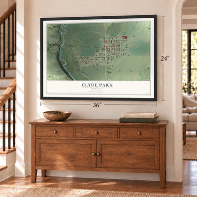 Clyde Park, Montana map, 24 x 36 inch print in a black frame above a dresser by a staircase