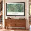 Douglasville, Georgia map, 24 x 36 inch print in a black frame above a dresser by a staircase